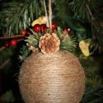Christmas 2018 - burlap ball ornament with red berries and pine cones